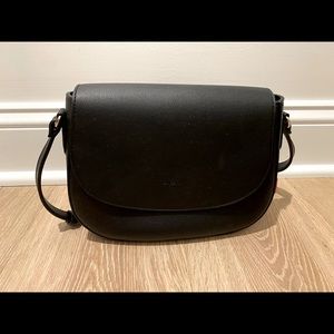 Angela Roi Morning vegan crossbody bag in black with gold hardware.